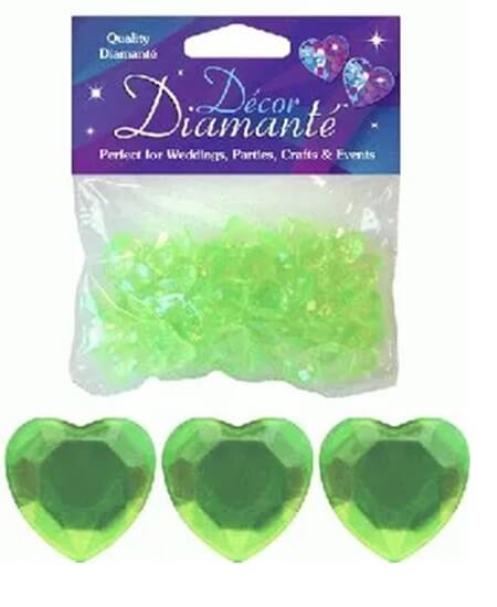 Limegrønne hjerteformede pynte diamanter i pose samt tre fremviste akryl hjerter foran produktet.